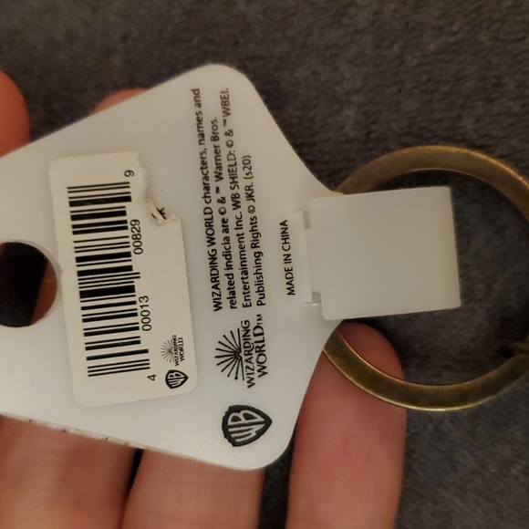 NWT Harry Potter metallic pivotal keychain. Four houses. From NYC store. - Picture 7 of 7